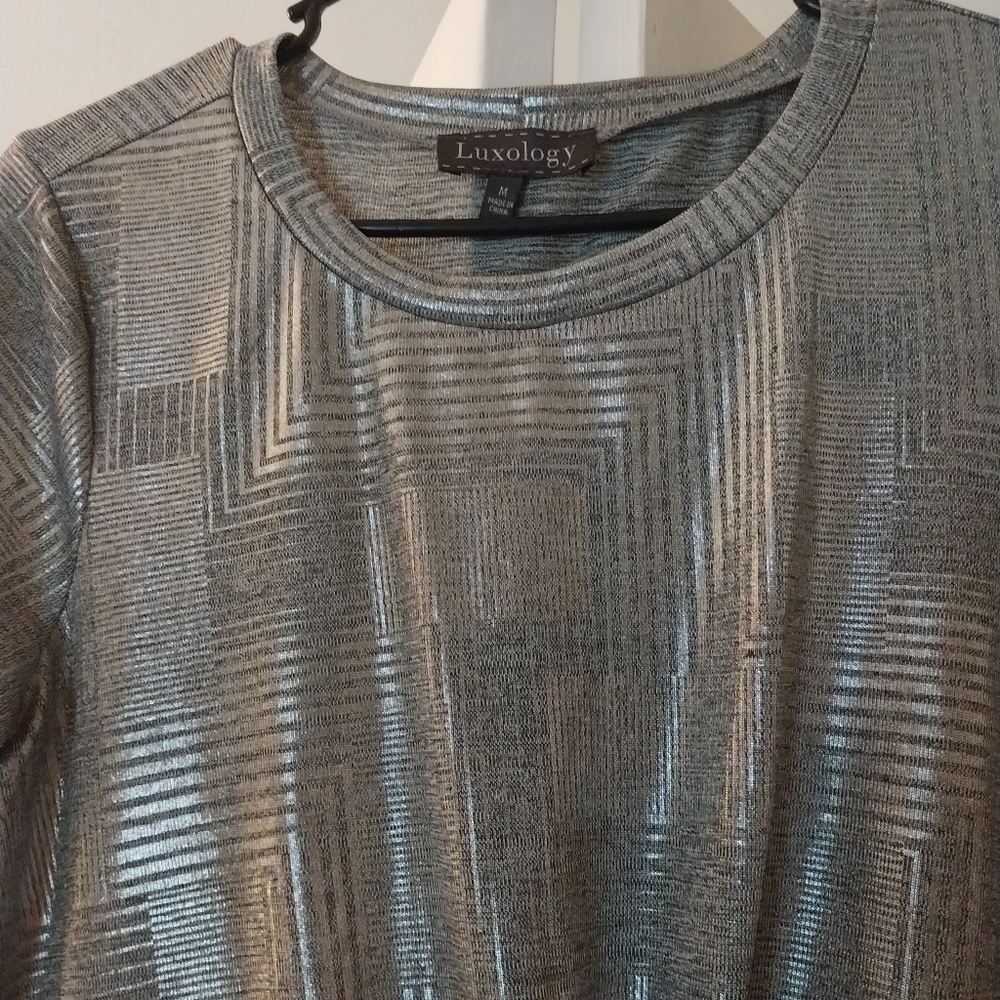Silver short sleeve shirt, shiny..Luxology brand.